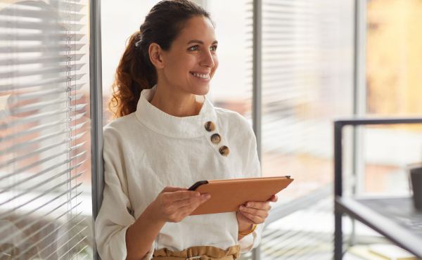 Woman on tablet working